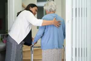 woman guiding an elderly