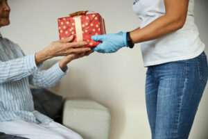 giving gift to caregiver